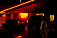 JoAnn in front of Sonny's BBQ.JPG